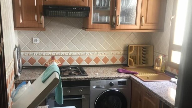 Departamento, 2 habitaciones | Cocina privada | Refrigerador con congelador, parrilla de estufa y utensilios de cocina 