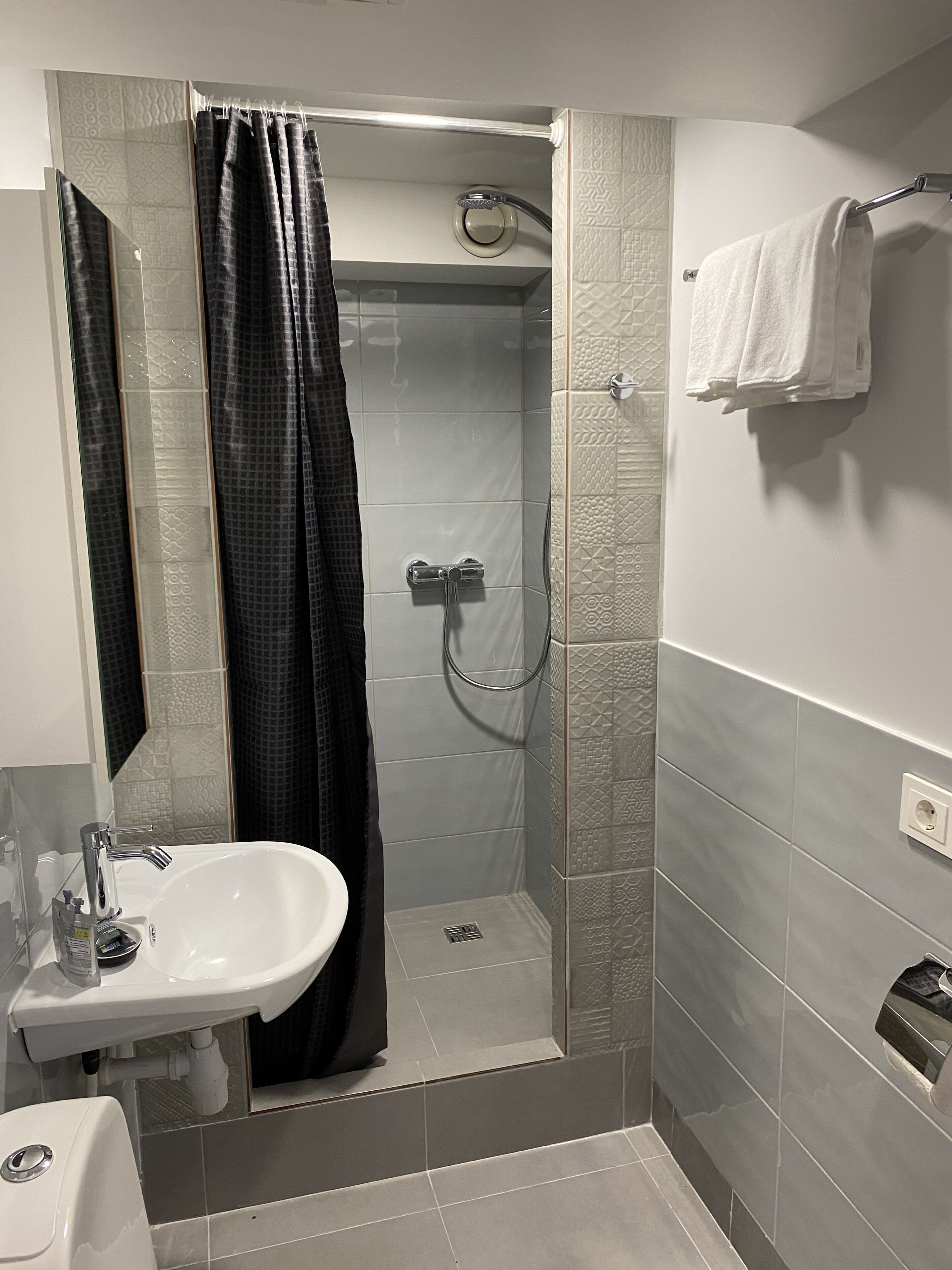 superior quadruple room | bathroom | shower, free toiletries, hair dryer, towels
