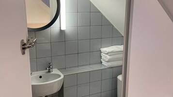 Shower, free toiletries, hair dryer, towels