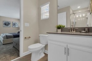 Bathtub, hair dryer, towels