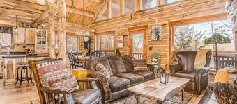 Delightful Riverfront Cabin with Wood-Burning Fireplace and Gas Grill & Hot Tub