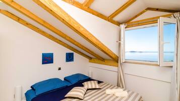 Apartment (Two Bedroom Apartment with Balcony) | 4 bedrooms, in-room safe, iron/ironing board, cribs/infant beds