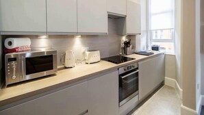 Unclassified image, 2 of 14, button - Regent Comfort Apartments (Glasgow)