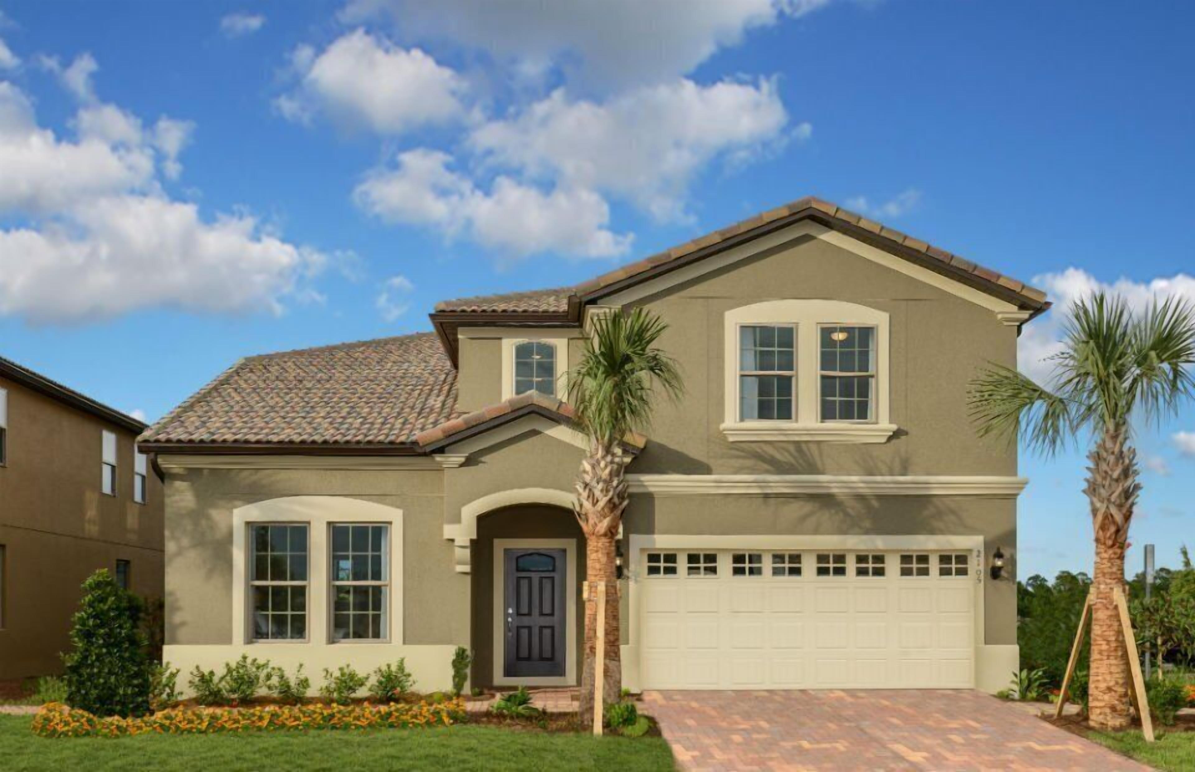 A two-story house with a garage, a front door, and a driveway.