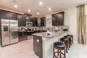 Villa (Champions Gate IHR 4036) | Private kitchen | Fridge, microwave, cookware/dishes/utensils - Champions Gate IHR 4036 (Davenport)