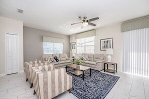 House | Living room | Flat-screen TV - Disney Area 5 Bedroom Private Pool Storey Lake (Kissimmee)