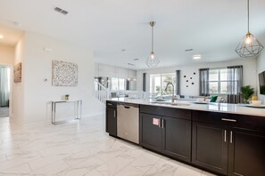 Villa (1521MC Amazing Champions Gate 8 Bedro) | Private kitchen | Fridge, microwave, cookware/dishes/utensils - 1521mc Amazing Champions Gate 8 Bedroom 5 Bed (Davenport)