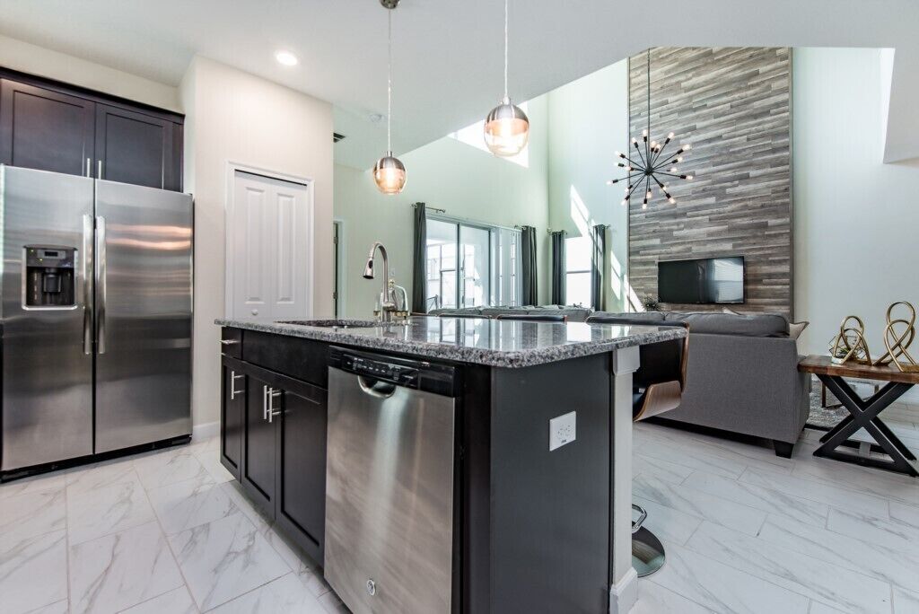 Villa (Storey Lake 5 Bedroom Disney Area) | Private kitchen | Fridge, microwave, dishwasher, highchair