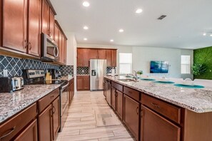 Villa | Private kitchen | Fridge, cookware/dishes/utensils