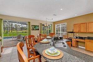 Villa | Private kitchen | Fridge, microwave, cookware/dishes/utensils