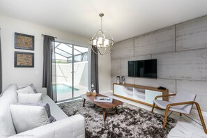House (4911WIND) | Living room | Flat-screen TV - Cool & Modern 4 Ved Storey Lake Pool Home 4911wind (Kissimmee)