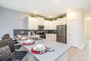 Villa (641PBEACH Amazing Champions Gate 8 Be) | Private kitchen | Fridge, microwave, cookware/dishes/utensils - 641pbeach Amazing Champions Gate 8 Bedroom 5 Bed (Kissimmee)