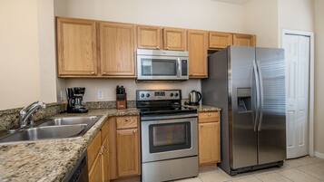 House (1104CAL) | Private kitchen | Fridge, microwave, highchair, cookware/dishes/utensils