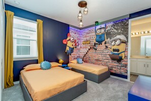 A bedroom with two beds, a brick wall mural, and a vanity with lights. - 1834cvt New Solara 9 Bedroom 6 Bathroom Resort (Kissimmee)