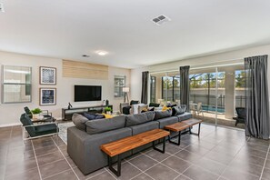 Villa (1564NPT New Solara 9 Bedroom 6 Bathro) | Living room | Flat-screen TV - 9 BD 6.5 BH With Game Room and Pool (Kissimmee)
