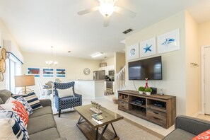 House (4 bed town home with full size pool C) | Living room | 32-inch TV with cable channels - 4 Bedroom Townhouse with Pool (Kissimmee)