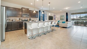 Villa | Private kitchen | Fridge, microwave, cookware/dishes/utensils
