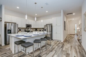 Villa | Private kitchen | Fridge, microwave, cookware/dishes/utensils