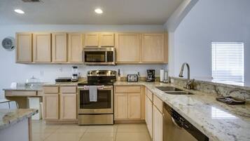 Villa | Private kitchen | Fridge, microwave, cookware/dishes/utensils