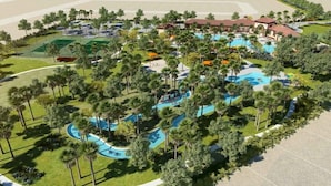 An aerial view of a resort with multiple swimming pools surrounded by palm trees and greenery. - 7008oakwood (Davenport)