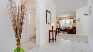 Villa | Living room | Flat-screen TV, fireplace, foosball