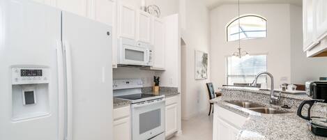 Villa | Private kitchen | Fridge, microwave, oven, dishwasher