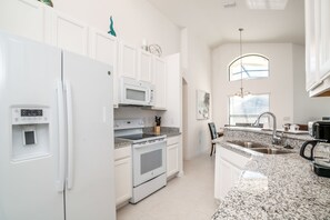 Villa | Private kitchen | Fridge, microwave, oven, dishwasher