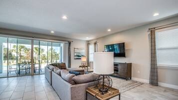 Villa (Amazing 11 Bedroom Encore Resort Porp) | Living room | Flat-screen TV, foosball