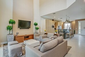House (7601RECIFE) | Living room | Flat-screen TV - Modern Magic Village Resort Townhome (Kissimmee)