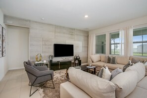Villa (6070BOA  Luxury 6 Bedroom 4.Bath  Hom) | Living room | 55-inch flat-screen TV with digital channels, TV, video game console - 6bed 4Ba Villa Game Room Pool Spa (Davenport)