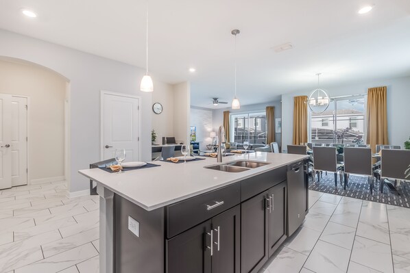 Villa | Private kitchen | Fridge, microwave, cookware/dishes/utensils