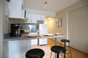 Apartemen | Dapur pribadi | Lemari es besar, microwave, oven, dan mesin pencuci piring