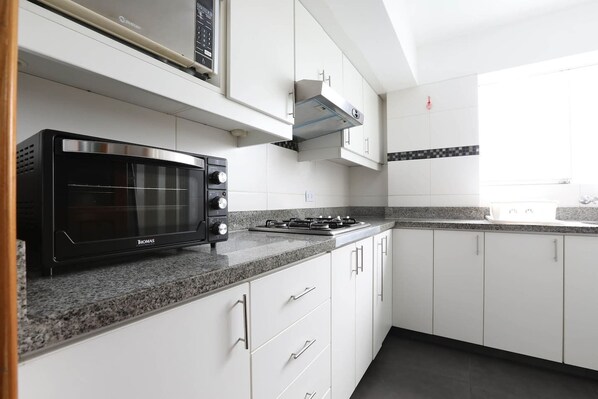 Apartment | Private kitchen | Fridge, microwave, oven, coffee/tea maker
