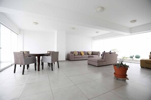 Apartment | Living area | Flat-screen TV - Brand new 2 dorm apt one block from boardwalk (Lima)