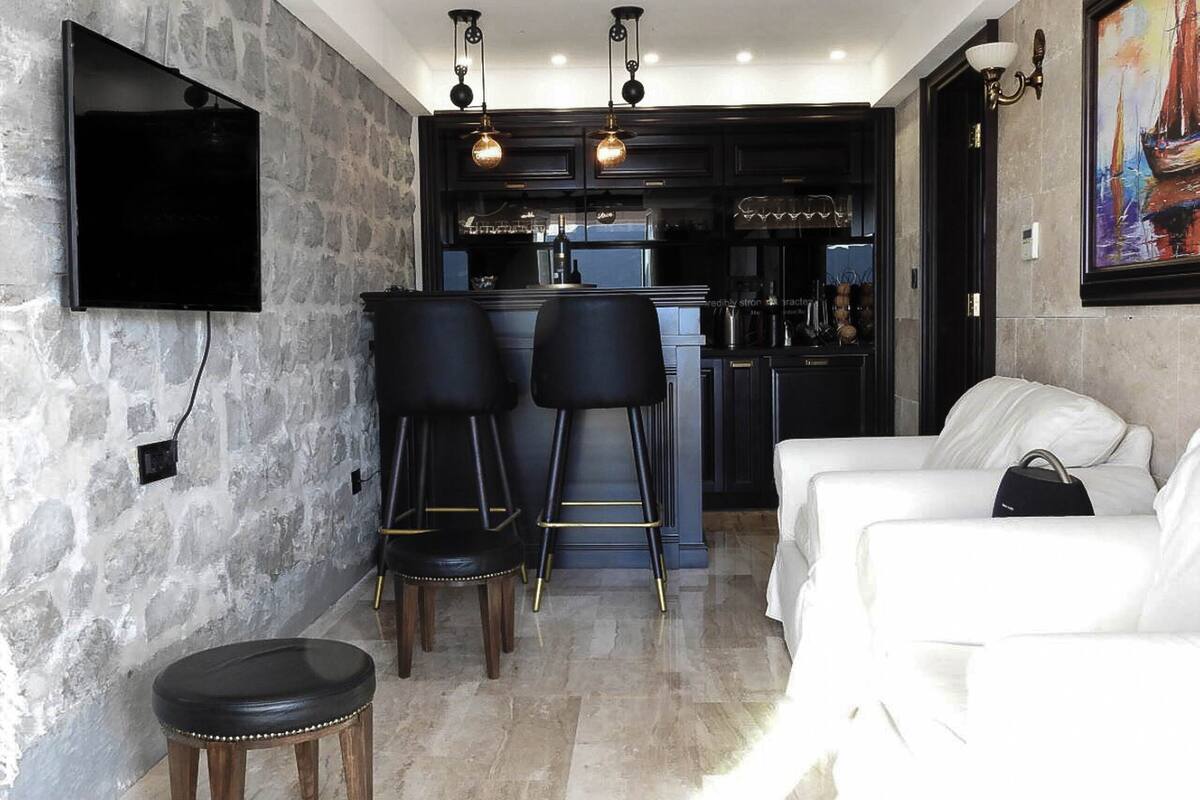 Comfort Apartment | Living area | Flat-screen TV