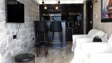 Comfort Apartment | Living area | Flat-screen TV