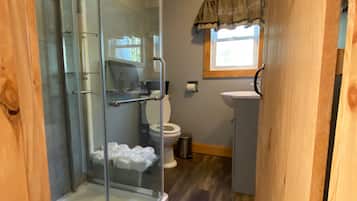 Shower, hair dryer, towels, soap
