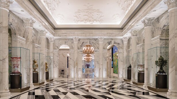 A grand lobby with marble columns, a checkered floor, and a central chandelier. - Grand Lisboa Palace Macau (Cotai)
