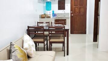 Family Apartment, 2 Bedrooms | Living area | 49-inch LED TV with cable channels, TV