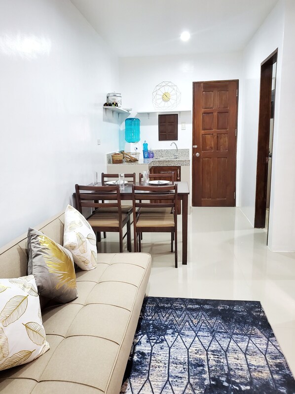Family Apartment, 2 Bedrooms | Living area | 49-inch LED TV with cable channels, TV - Balai Amigo Panglao Apartment (Dauis)