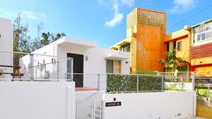 A gated residential area with a white building labeled "ANNEX B". - Annex B Onna (Onna)
