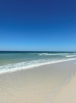 On the beach, sun-loungers, beach towels