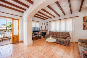 TV - Holiday Apartment Dofí On the Beach with Terrace, & Sea View (Cala Millor)