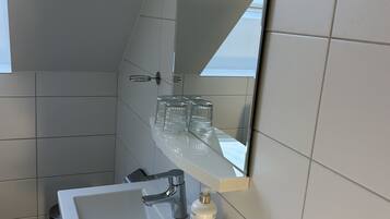 Shower, towels, soap, shampoo