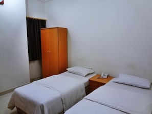Triple Room | Iron/ironing board, free WiFi - Sun City Hotel (Muscat)