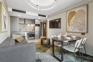 Two Bedroom King Apartment | Living area | 40-inch Smart TV with digital channels, TV - Melbourne City Apartment Hotel (West Melbourne)