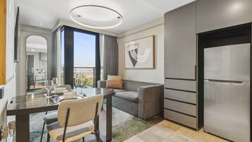 One Bedroom Queen Apartment | Living area | 40-inch Smart TV with digital channels, TV