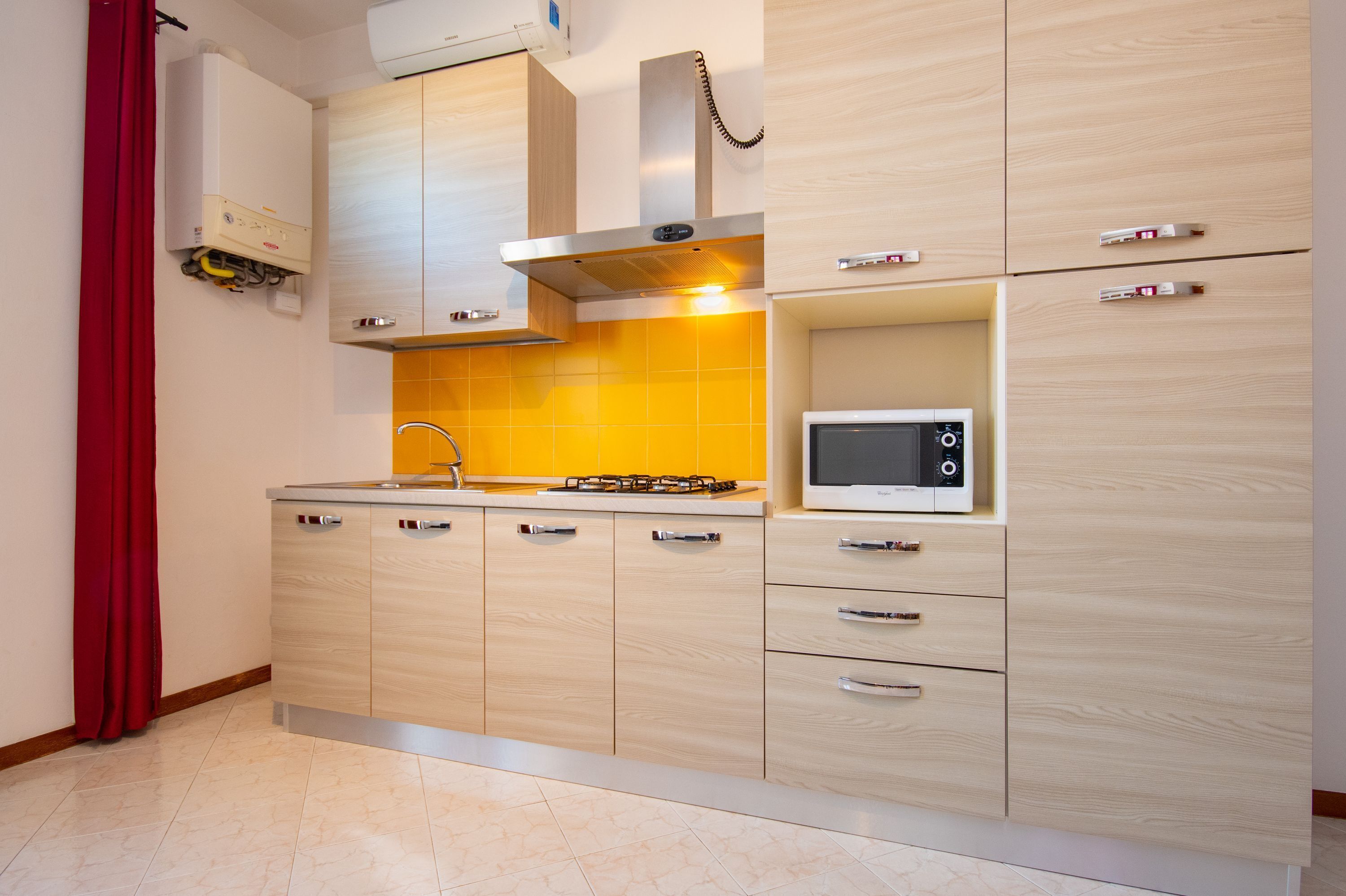 Fridge, microwave, stovetop, cookware/dishes/utensils