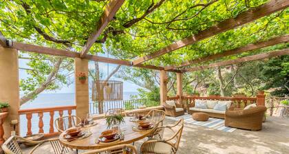 Paradise seafront villa in the idyllic Deia coast.