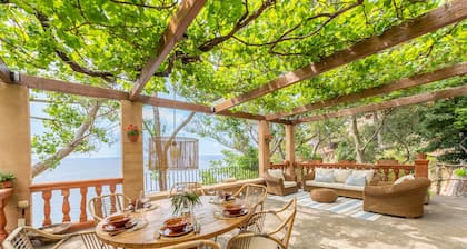 Paradise seafront villa in the idyllic Deia coast.